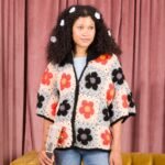 Crafting Elegance: The Vibrant Blooming Grannies Crochet Cardigan